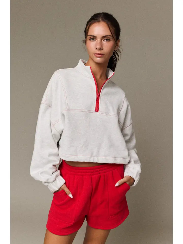 Red hem quarter zip