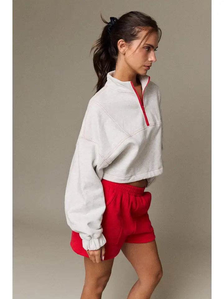 Red hem quarter zip